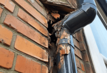 What Causes Water Marks Along the Bottom of Exterior Walls?